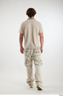 Lyle  1 back view beige cargo pants beige polo…